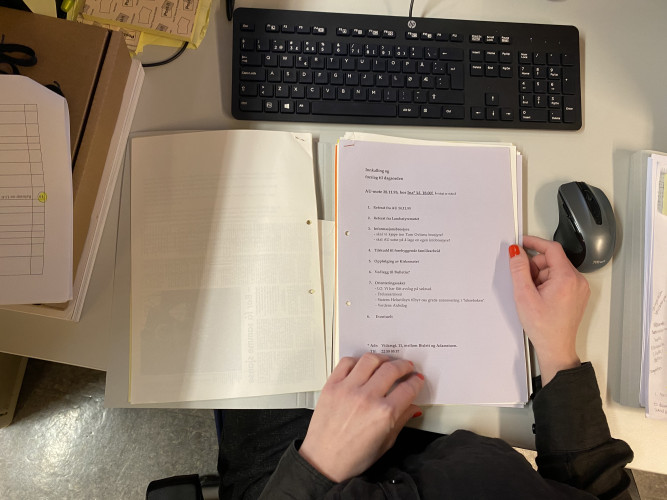 Et dokument som Silje jobber med: Innkalling og forslag til dagsorden. Arbeidsutvalget i 1995.